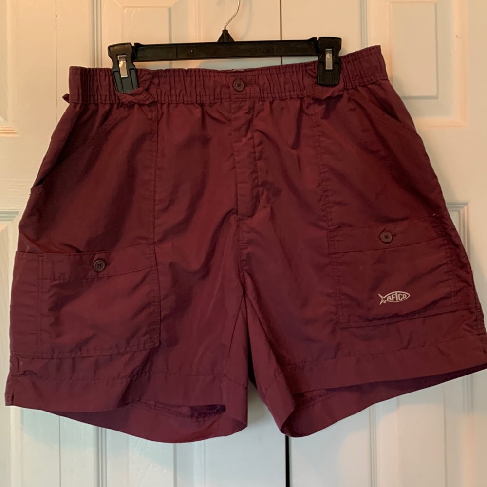 AFTCO mens classic fishing shorts. Color is wine